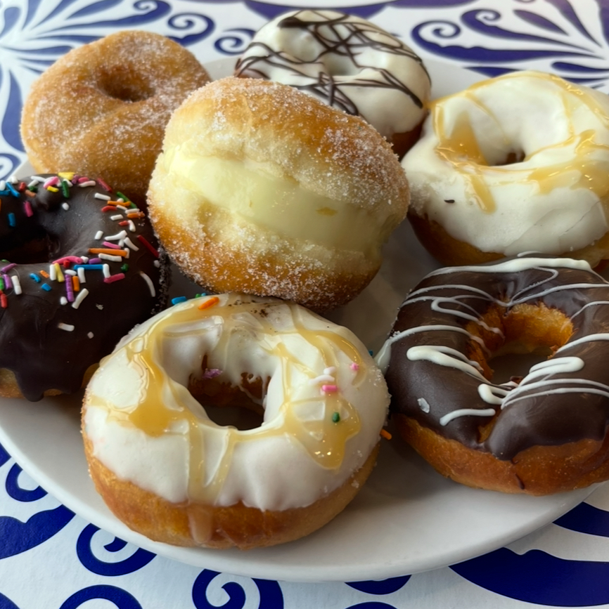 Seven different flavoured donuts